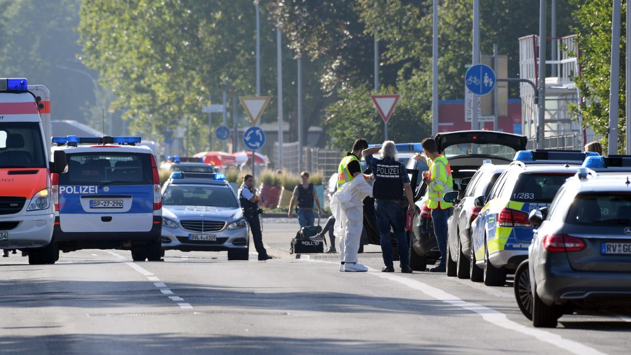 Police and ambulances stand near the disco Club Grey in the southern German town of Konstanz, where a gunman opened fire, killing one and wounding four people before being shot by police, on July 30, 2017. 
The 34-year-old attacker "was critically injured in a shootout with police officers as he left the disco, and later succumbed to his wounds in hospital," police said in a statement.
 / AFP PHOTO / dpa / Felix Kästle / Germany OUT        (Photo credit should read FELIX KASTLE/AFP/Getty Images)