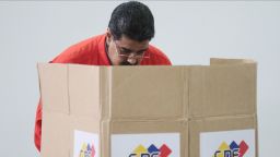 Handout photo released by the Venezuelan Presidency shows president Nicolas Maduro casting his vote in Caracas on July 30, 2017. Polls opened in Venezuela on Sunday for the election of a new, all-powerful "Constituent Assembly" that President Nicolas Maduro promised would end his country's political and economic crisis by rewriting the constitution. The vote has been fiercely opposed by months of deadly street protests and criticized internationally. Venezuela's opposition says it is a bid for the beleaguered Maduro to cling to power by getting around the parliament controlled by its lawmakers.