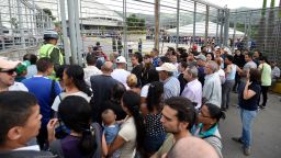 People queue to cast their vote to elect a Constituent Assembly in Caracas on Sunday.