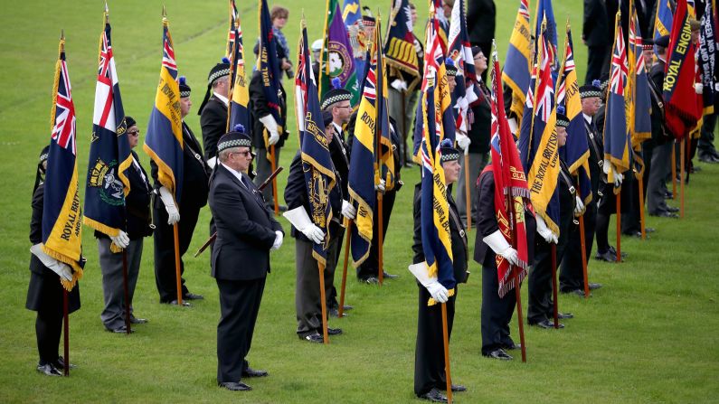 Veterans stand at attention during a service in Crieff.