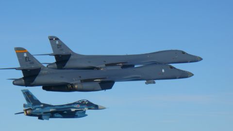 Two U.S. Air Force B-1B Lancers join a Japan Air Self-Defense Force F-2 fighter jet in a show of force after North Korea's latest missile test.