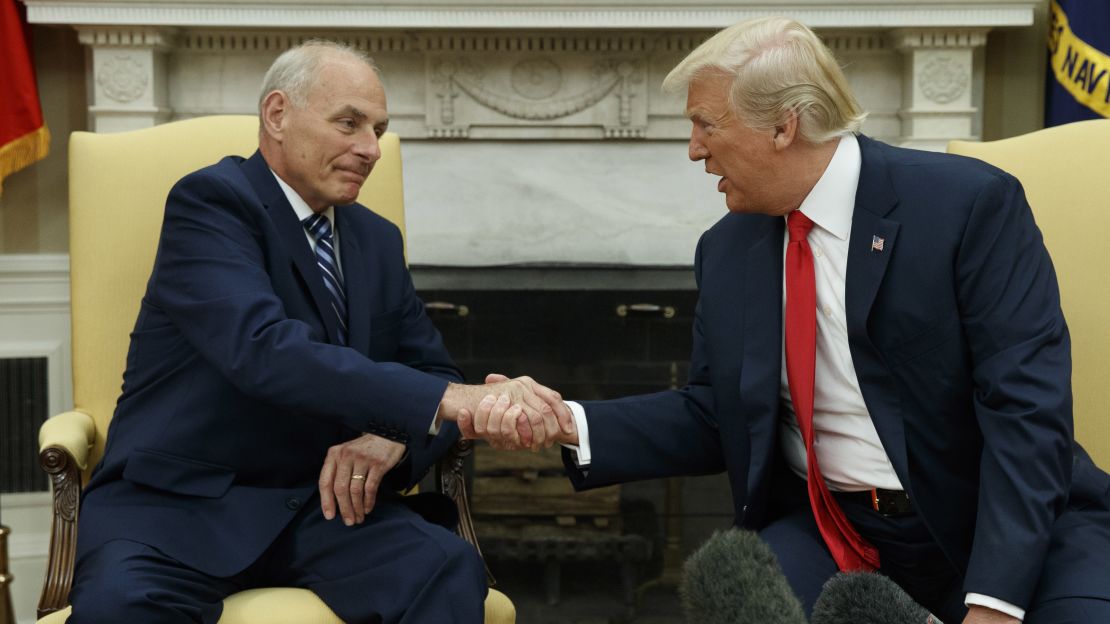 President Donald Trump talks with new White House chief of staff John Kelly after he was privately sworn in during a ceremony in the Oval Office  on Monday, July 31, 2017, in Washington. 