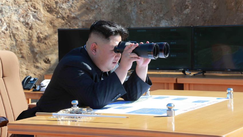 This picture taken and released on July 4, 2017 by North Korea's official Korean Central News Agency (KCNA) shows North Korean leader Kim Jong-Un inspecting the test-fire of intercontinental ballistic missile Hwasong-14 at an undisclosed location.
North Korea declared on July 4 it had successfully tested its first intercontinental ballistic missile -- a watershed moment in its push to develop a nuclear weapon capable of hitting the mainland United States. / AFP PHOTO / KCNA VIA KNS / STR / South Korea OUT / REPUBLIC OF KOREA OUT ---EDITORS NOTE--- RESTRICTED TO EDITORIAL USE - MANDATORY CREDIT "AFP PHOTO/KCNA VIA KNS" - NO MARKETING NO ADVERTISING CAMPAIGNS - DISTRIBUTED AS A SERVICE TO CLIENTS
THIS PICTURE WAS MADE AVAILABLE BY A THIRD PARTY. AFP CAN NOT INDEPENDENTLY VERIFY THE AUTHENTICITY, LOCATION, DATE AND CONTENT OF THIS IMAGE. THIS PHOTO IS DISTRIBUTED EXACTLY AS RECEIVED BY AFP.
/ (Photo credit should read STR/AFP/Getty Images)