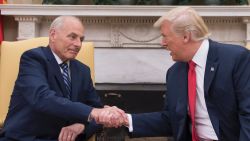 President Donald Trump shakes hands with newly sworn-in White House Chief of Staff John Kelly at the White House in Washington, DC, on July 31, 2017.