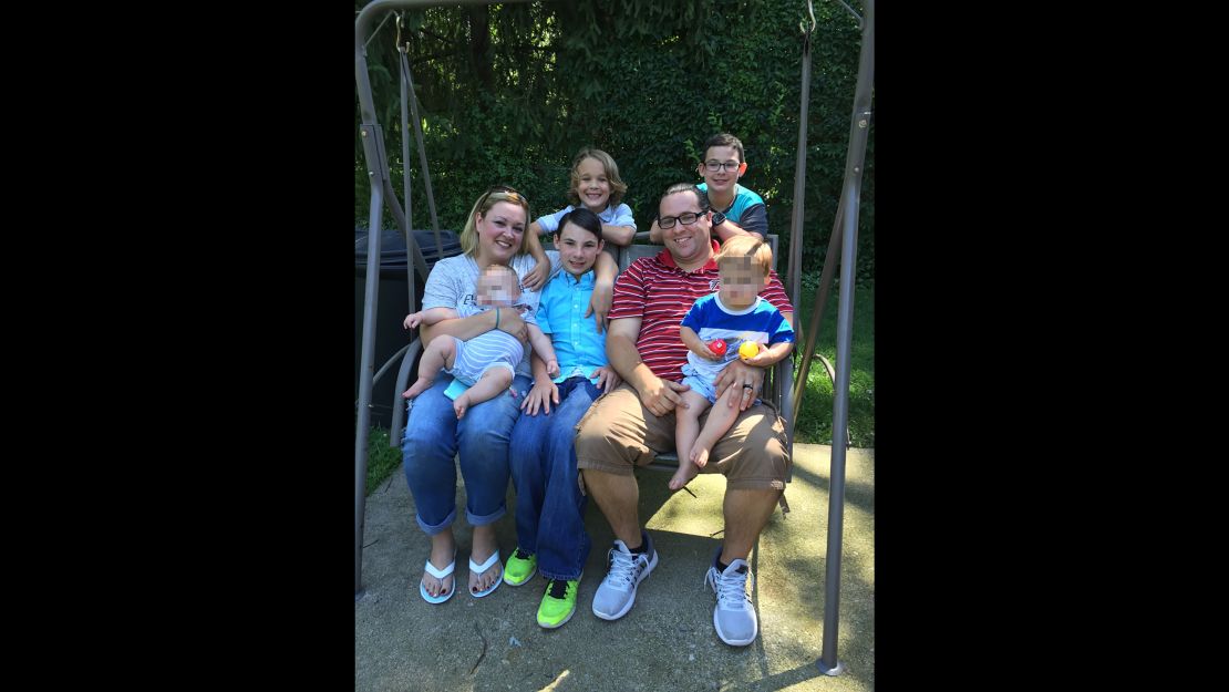 Cyndi and Jesse Swafford, shown with their foster, adopted and biological children. CNN obscured a portion of this image to protect the identities of two foster children.