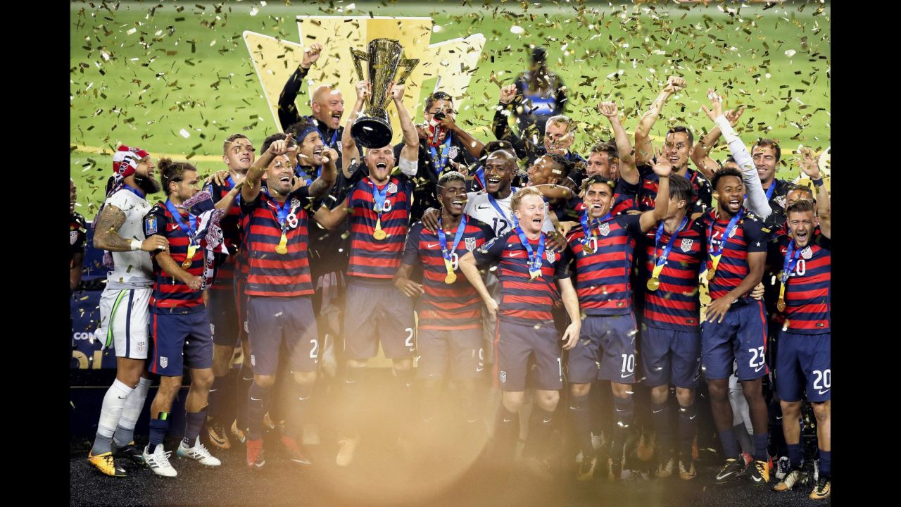 US soccer captain Michael Bradley lifts the Gold Cup as he and his teammates celebrate their tournament victory in Santa Clara, California, on Wednesday, July 26. The Americans defeated Jamaica 2-1 in the final.