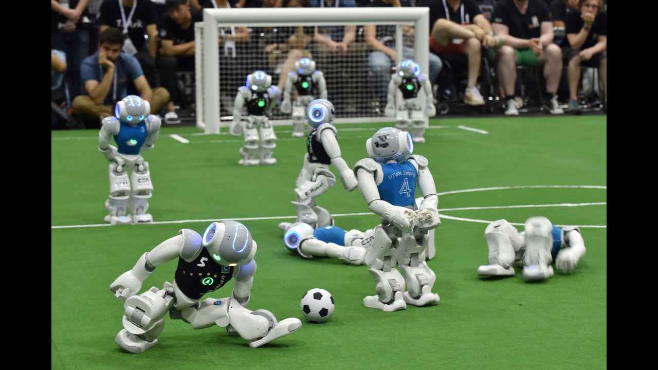 Robots play soccer during the RoboCup tournament in Nagoya, Japan, on Sunday, July 30. The annual event attracts robotics teams from all over the world.