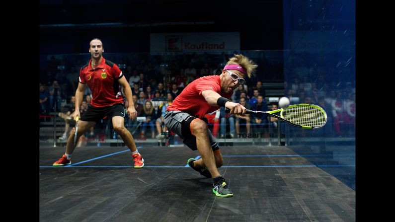 Polish squash player Wojciech Nowisz plays a shot against Germany's Simon Rosner during a World Games match on Tuesday, July 25. Rosner would go on to win gold.
