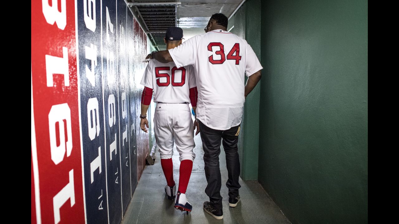 Former Boston Red Sox star David Ortiz, right, walks with current Red Sox star Mookie Betts before a game at Fenway Park on Sunday, July 30. Ortiz was attending a reunion of the 2007 team that won the World Series. <a href="http://www.cnn.com/2017/07/24/sport/gallery/what-a-shot-sports-0725/index.html" target="_blank">See 27 amazing sports photos from last week</a>