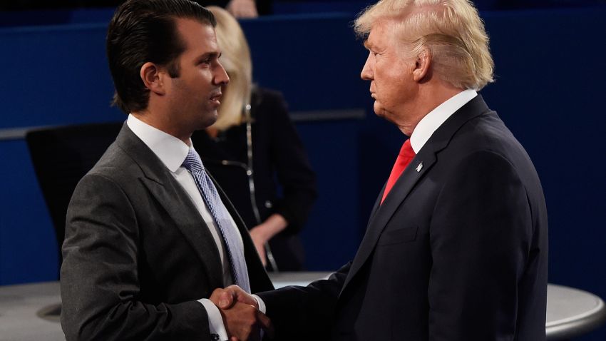 ST LOUIS, MO - OCTOBER 09: Donald Trump, Jr. (L) greets his father Republican presidential nominee Donald Trump during the town hall debate at Washington University on October 9, 2016 in St Louis, Missouri. This is the second of three presidential debates scheduled prior to the November 8th election. (Photo by Saul Loeb-Pool/Getty Images)
