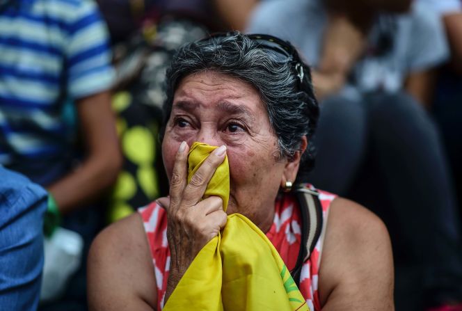A woman in Caracas attends a vigil Monday, July 31, for anti-government activists who have died in the country's recent unrest. <a href="index.php?page=&url=http%3A%2F%2Fwww.cnn.com%2F2017%2F08%2F01%2Famericas%2Fvenezuela-election-unrest%2Findex.html">More than 120 people have been killed in Venezuela </a>since early April, according to the attorney general's office.