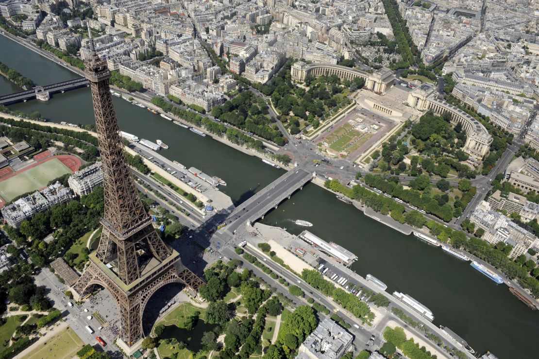 The Eiffel Tower stands on the south bank of the River Seine.