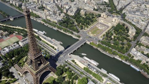 The Eiffel Tower stands on the south bank of the River Seine.