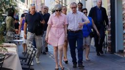 Britain Prime Minister Theresa May (L) walks with her husband Philip (R) in Desenzano del Garda, by the Garda lake, as they holiday in northern Italy, on July 25, 2017.
 May is spending her holidays in northern Italy. / AFP PHOTO / POOL AND AP / Antonio Calanni        (Photo credit should read ANTONIO CALANNI/AFP/Getty Images)