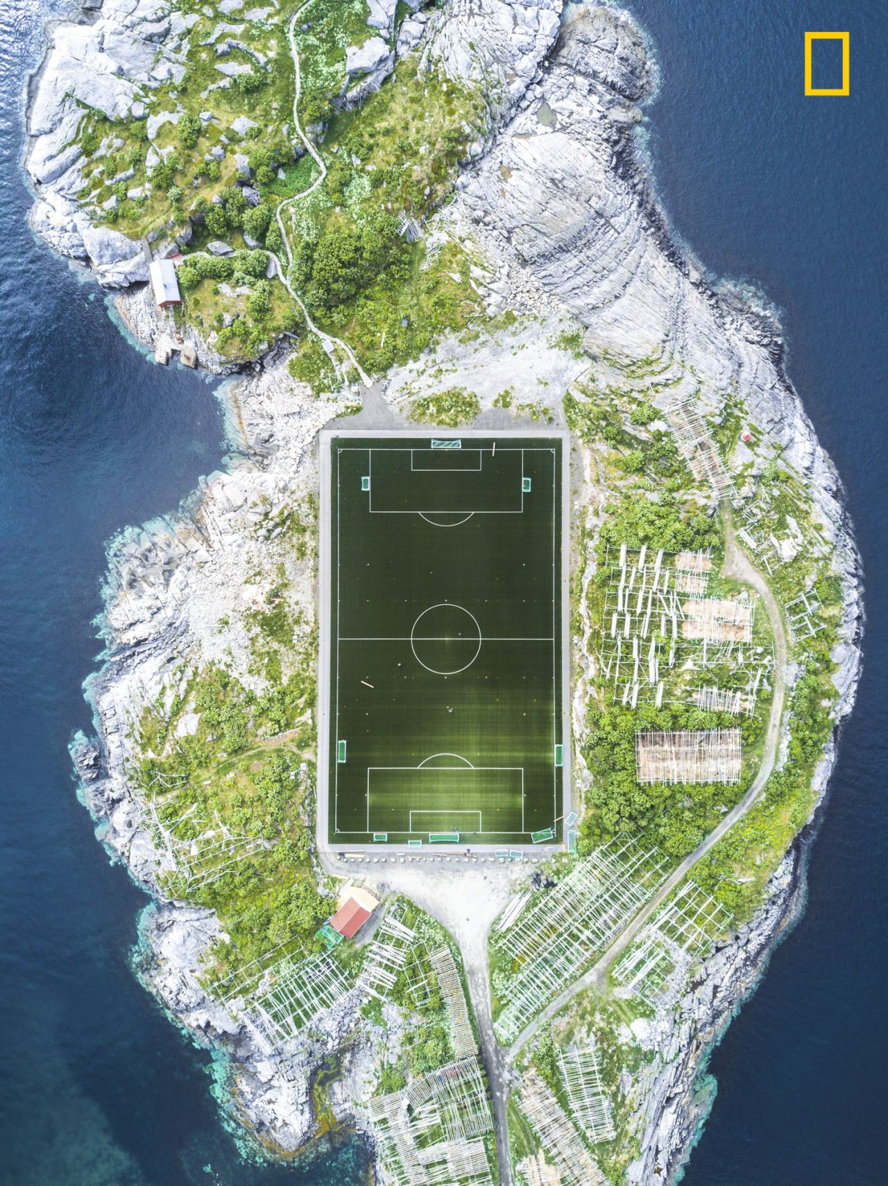 <strong>3rd Prize City Category -- "Henningsvær Football Field":</strong> The third prize winner in the city category of the <a href="http://travel.nationalgeographic.com/photographer-of-the-year-2017/" target="_blank" target="_blank">2017 National Geographic Travel Photographer of the Year Contest </a>is <a href="http://yourshot.nationalgeographic.com/profile/1392792/" target="_blank" target="_blank">Misha De-Stroyev</a>. De-Stroyev explains the story behind the drone image: "This football field in Henningsvær in the Lofoten Islands is considered one of the most amazing fields in Europe, and maybe even in the world. The photo was taken during a 10-day sailing trip in Norway in June 2017. We arrived to Henningsvær after a week of sailing through the cold and rainy weather. Upon our arrival, the weather cleared up. I was really lucky that the conditions were suitable for flying my drone, and I managed to capture this shot from a height of 120 meters."