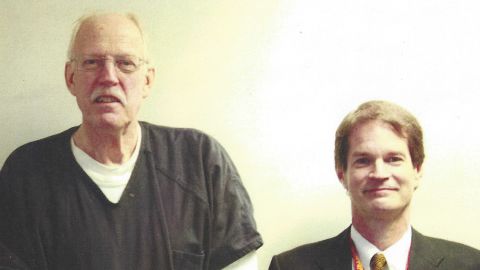 Retired US State Department Supervisory Special Agent Robert David Booth, right, stands beside convicted American spy Kendall Myers in 2009. Myers, a former State Department officer, was sentenced to life in prison for giving highly sensitive US diplomatic secrets to Cuba. 