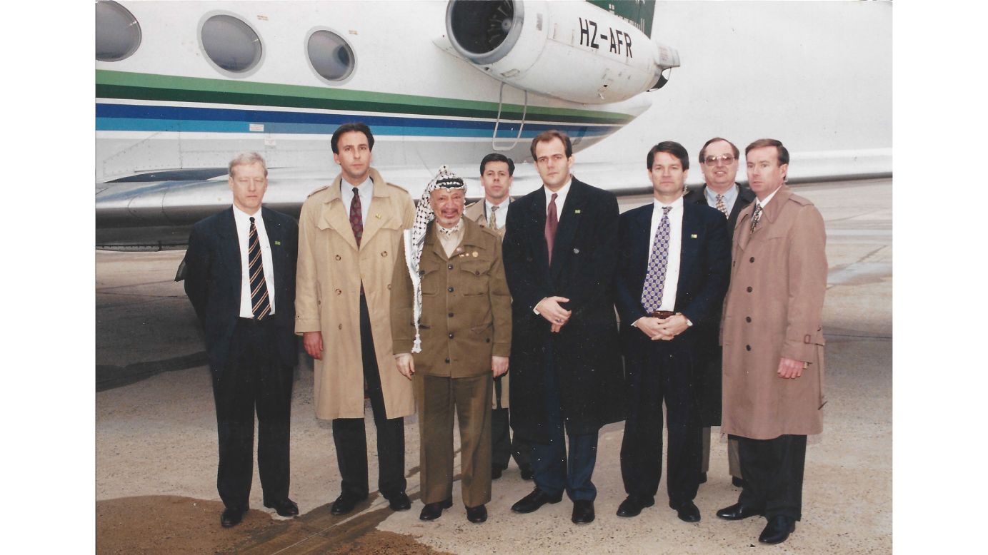 In the late 1990s, Booth, third from the right, was assigned to protect Palestinian leader Yasser Arafat, shown here shortly before his departure outside Washington, D.C. at what was then Andrews Air Force Base in Maryland.
