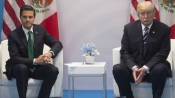 US President Donald Trump and Mexican President Enrique Pena Nieto hold a meeting on the sidelines of the G20 Summit in Hamburg, Germany, on July 7, 2017. / AFP PHOTO / SAUL LOEB    