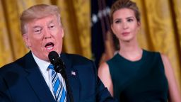 US President Donald Trump speaks next to his daughter Ivanka during an event with small businesses at the White House in Washington, DC, on August 1, 2017.   / AFP PHOTO / JIM WATSON        (Photo credit should read JIM WATSON/AFP/Getty Images)