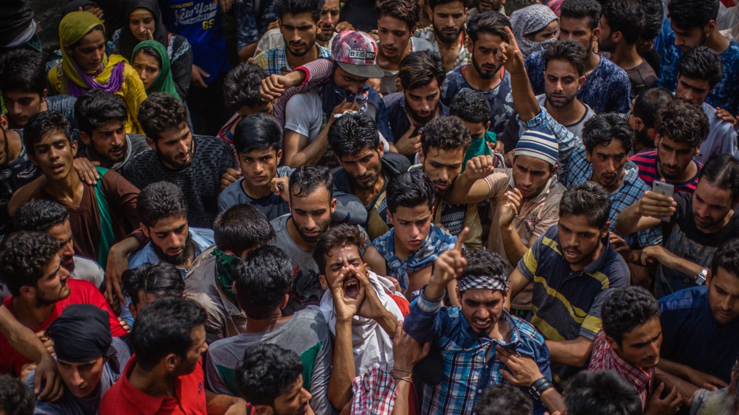 Kashmiris  shout anti-Indian slogans during the funeral of a militant leader killed in a gun battle with police, on August 01, 2017.