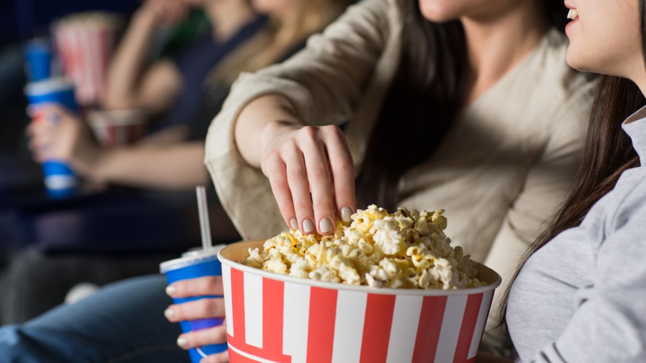 Very little of the bacteria on hands was found to transfer to the popcorn in a shared bowl. More hand bacteria are transferred when you take a mouthful of popcorn, though. 