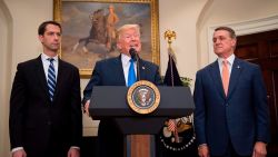 US President Donald Trump (C) makes an announcement on immigration with US Senator Tom Cotton (L), R-Arkansas and US Senator David Perdue (R), R-Georgia, at the White House in Washington, DC, on August 2, 2017.   / AFP PHOTO / JIM WATSON        (Photo credit should read JIM WATSON/AFP/Getty Images)