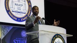 NAACP Interim President Derrick Johnson speaks at the NAACP's 108th Annual Convention in Baltimore on July 24. NAACP members voted to support the travel advisory issued by the Missouri conference at the convention.