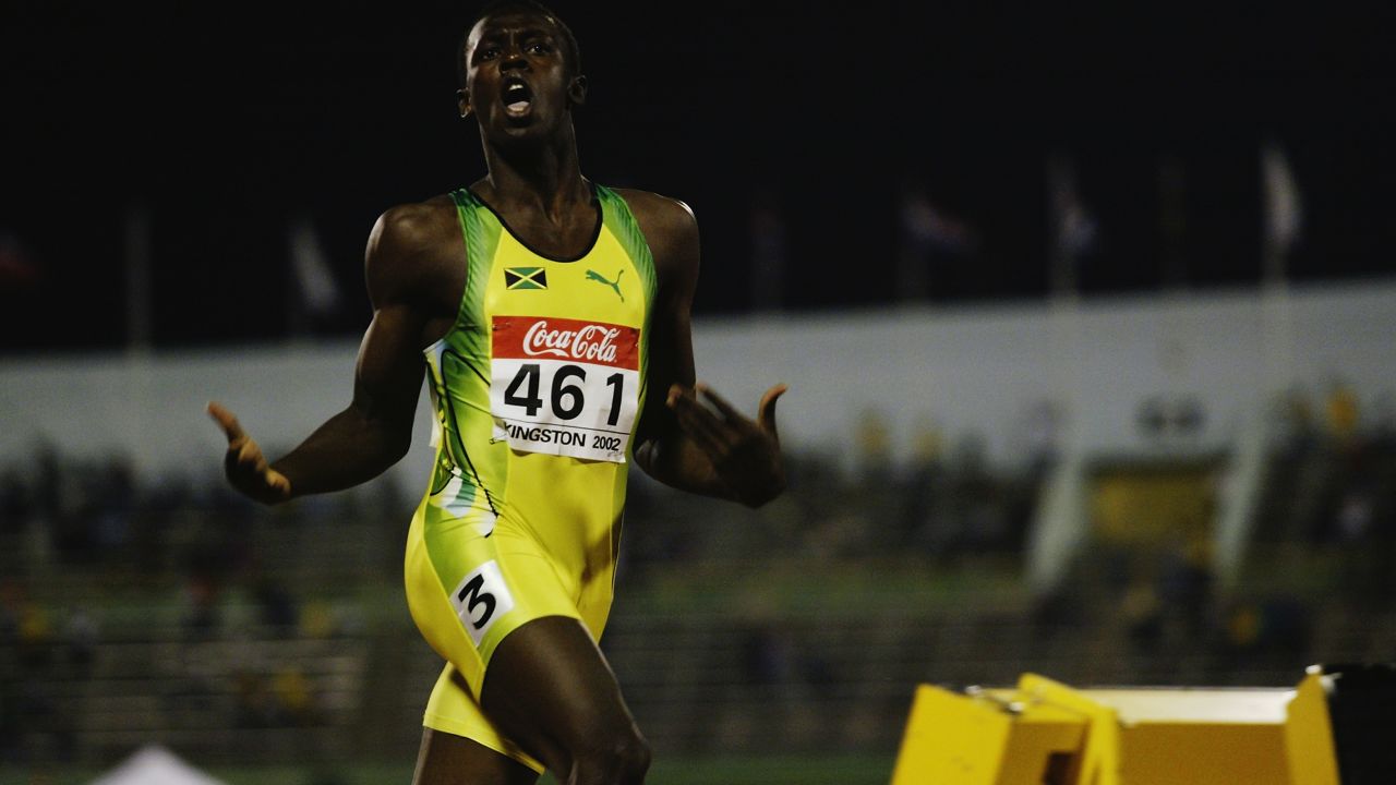 Bolt, aged 15, winning 200m at the IAAF Junior Athletics World Championships in 2002