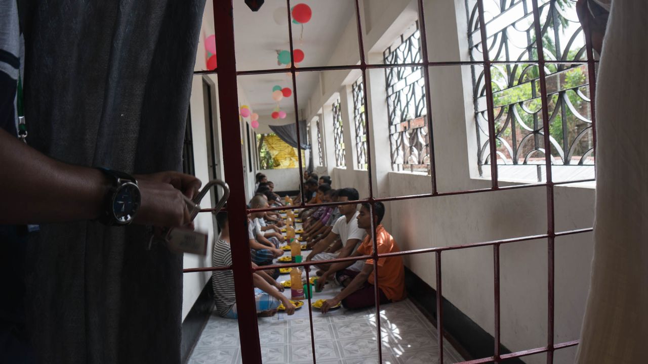 Clients at an addiction treatment centre in Bangladesh eat lunch together. They form a therapeutic community and help each other to stay clean. It's not a prison, but the doors are locked in case the craving for drugs becomes so unbearable that they try to escape.