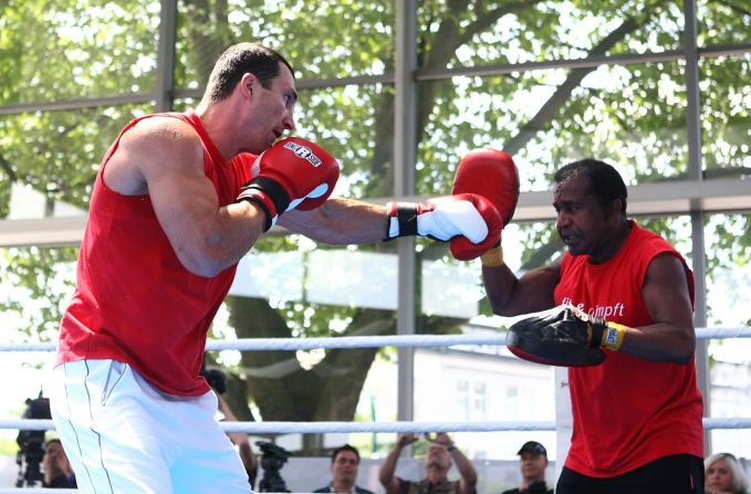 Klitschko spars with his long-term coach Emanuel Steward. The pair worked together from 2004 to Steward's death in 2012.