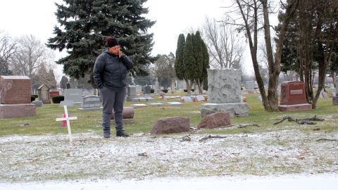 Cynthia Lane visits her son's grave.