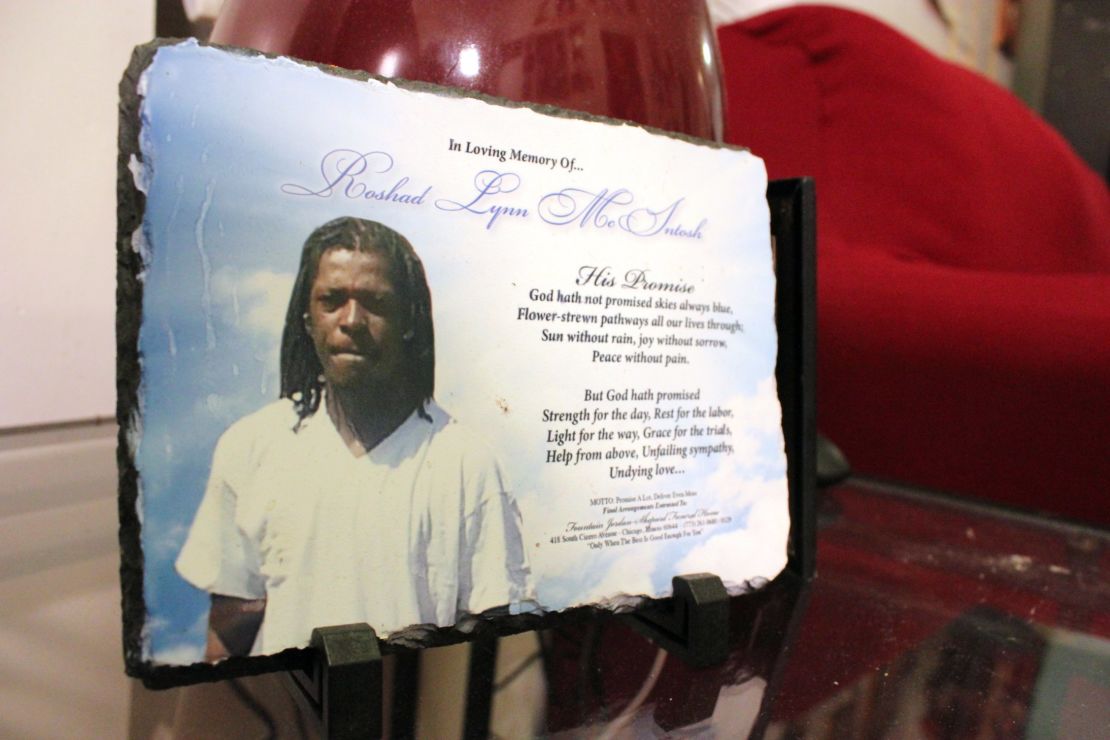 Cynthia Lane keeps this prayer and photo of her son Roshad McIntosh in her living room. 