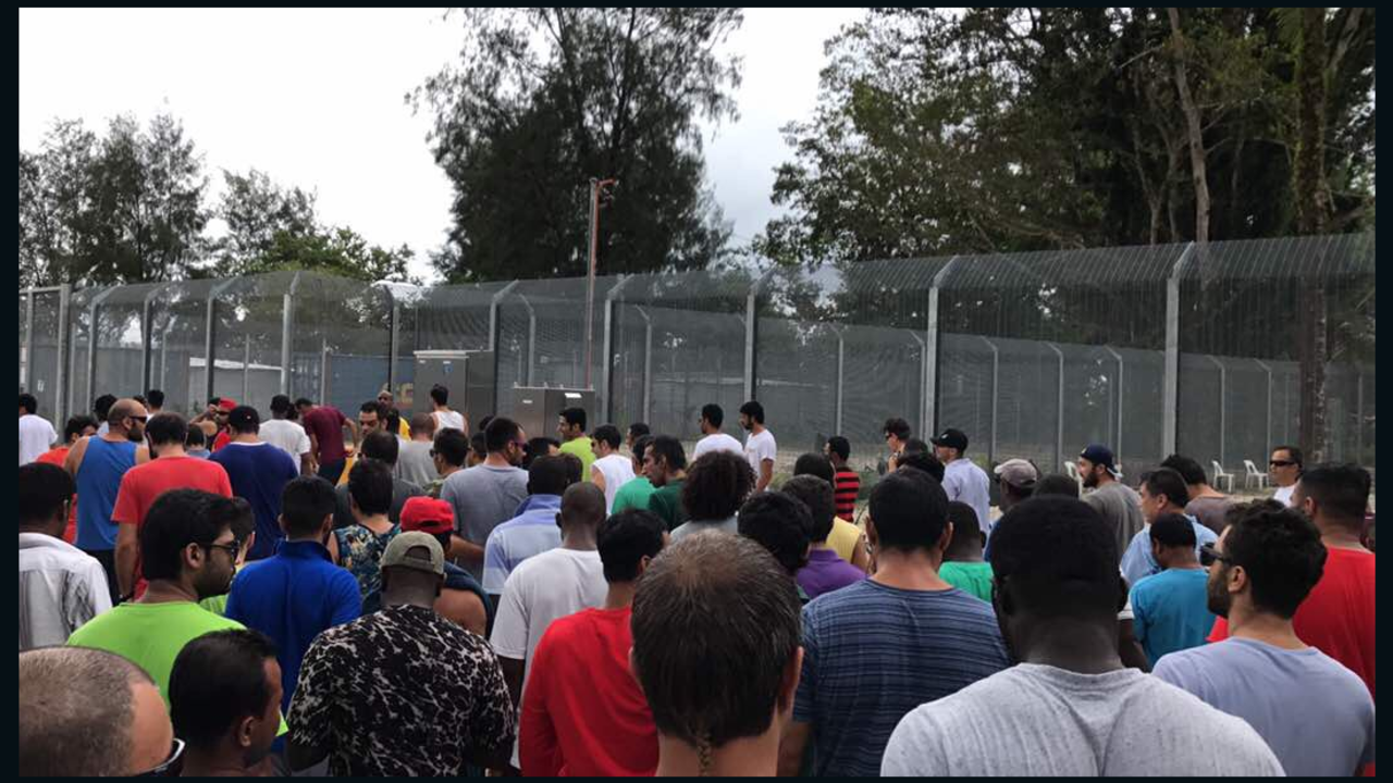 Refugees and migrants at the Manus Island detention center protest against electric and water cuts on Thursday.