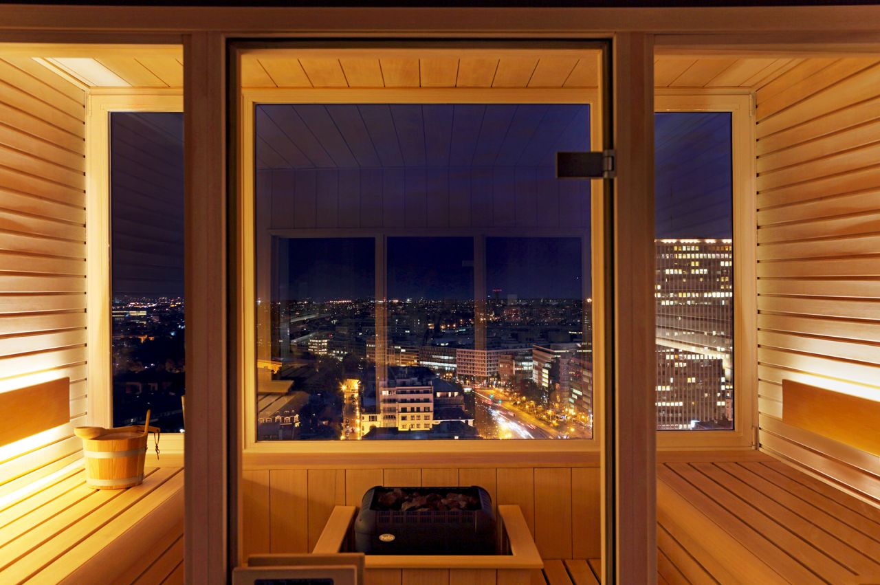 Hotel Brussels' lofty sauna lets you sweat and snooze while enjoying the views.