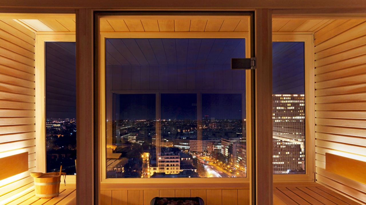 Hotel Brussels' lofty sauna lets you sweat and snooze while enjoying the views.