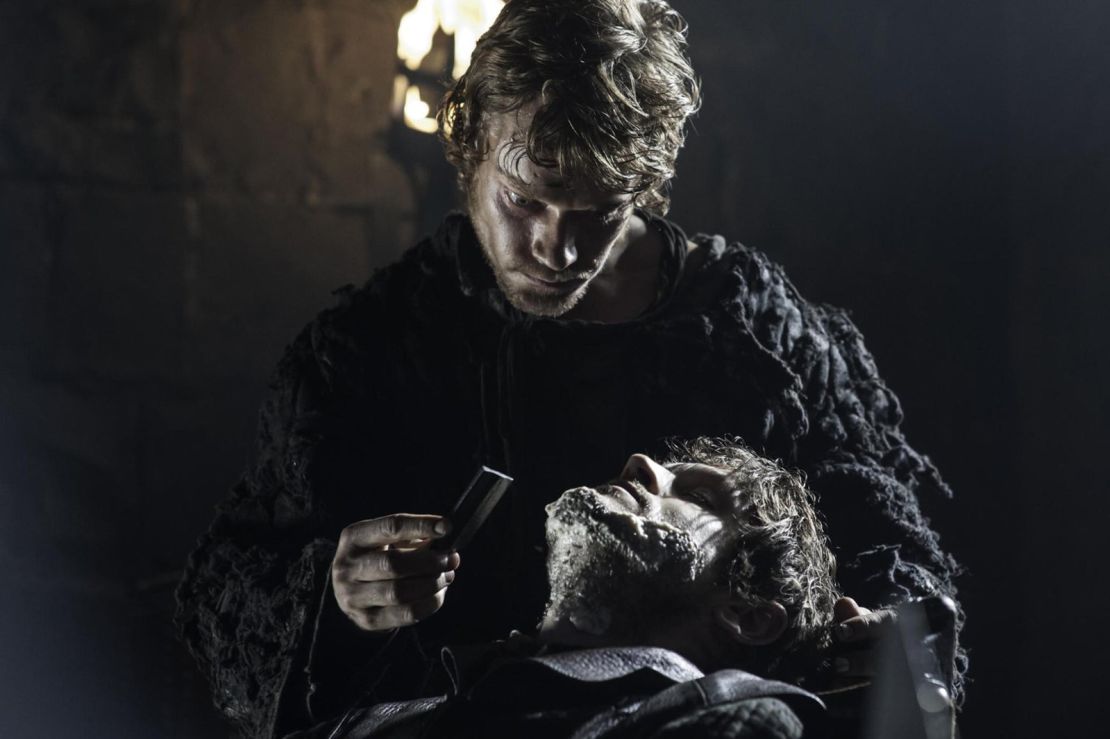 Theon shaves Ramsay Bolton, showing his full acquiescene to his servile 'Reek' character
