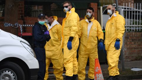 Police prepare to search for evidence Monday in the Sydney suburb of Lakemba.