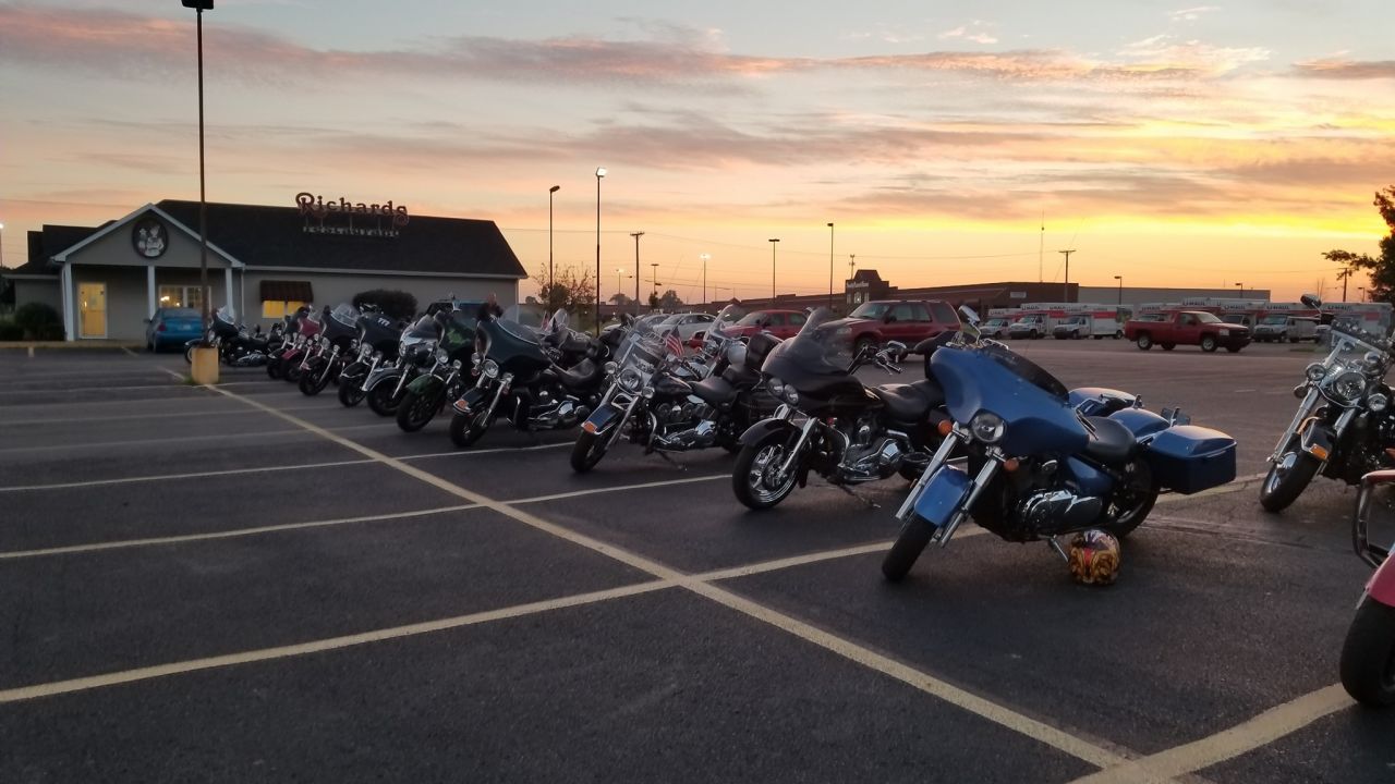 Motorcyclists get ready to escort Phil Mick to his first day of school.