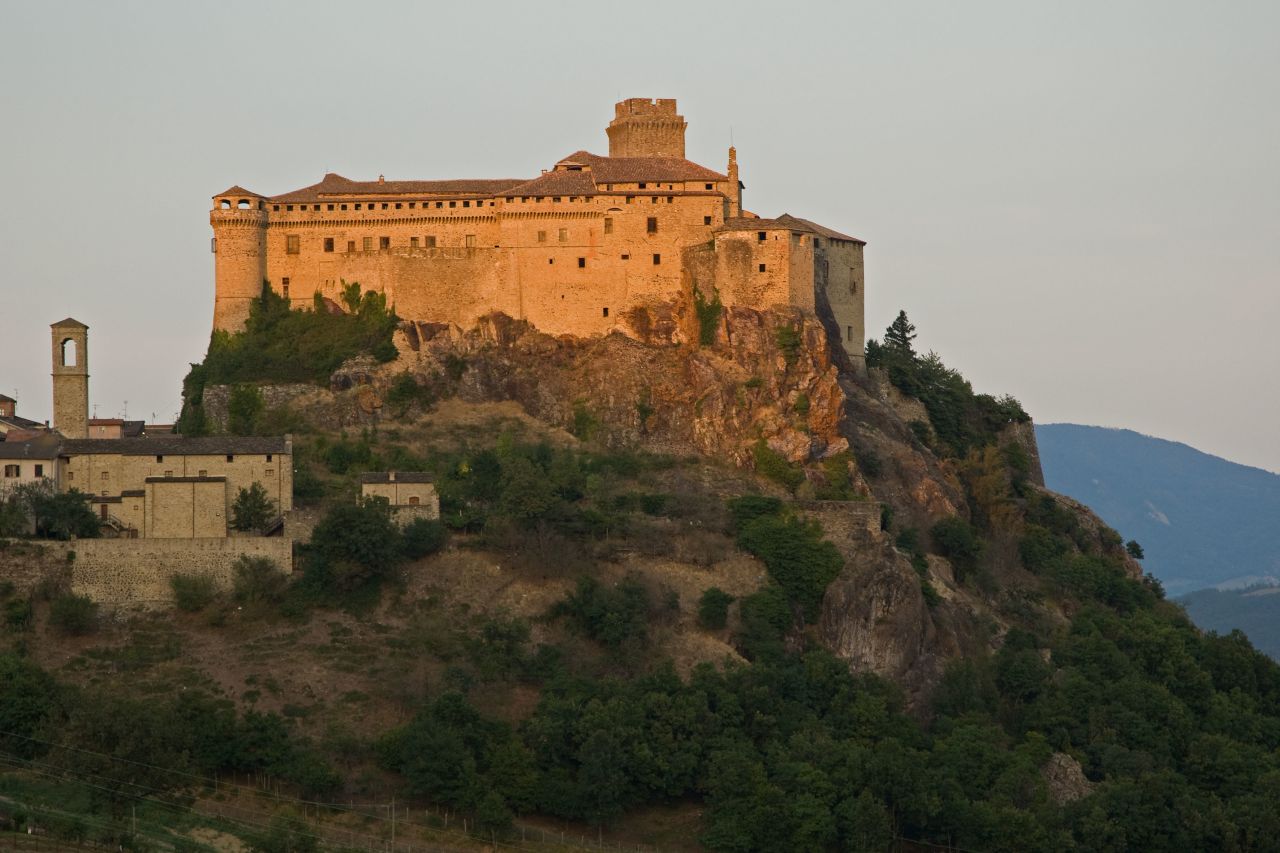 <strong>Bardi, Italy: </strong>The Castello dei Landi teeters on top of a sheer rock spur near Parma in the Emilia-Romagna region of northern Italy. The ancient citadel and winding streets of the picturesque town stand sentinel over the Ceno Valley. <br />