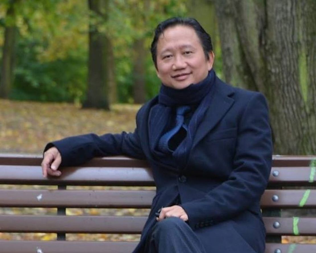 Trinh sitting on a park bench in Berlin, Germany, in an undated photo taken before his return to Vietnam.