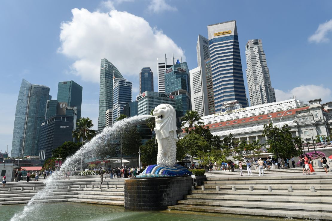 Singapore's famous Merlion (C) in front of the city's skyline in February, 2015.