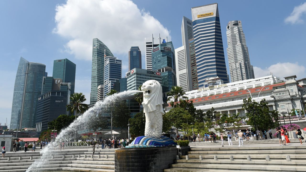 Singapore's famous Merlion (C) in front of the city's skyline in February, 2015.