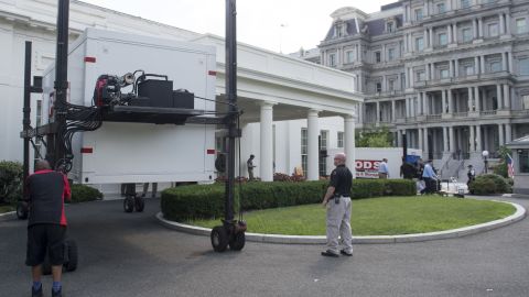 Storage containers are delivered outside the West Wing of the White House in Washington, DC, August 4, 2017, as workers prepare to complete maintenance and updates to the West Wing.