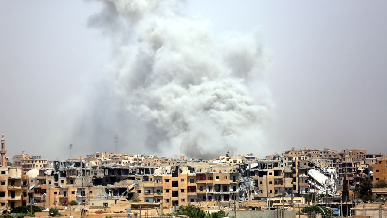 Smoke billows out from Raqqa after a coalition airstrike in July.