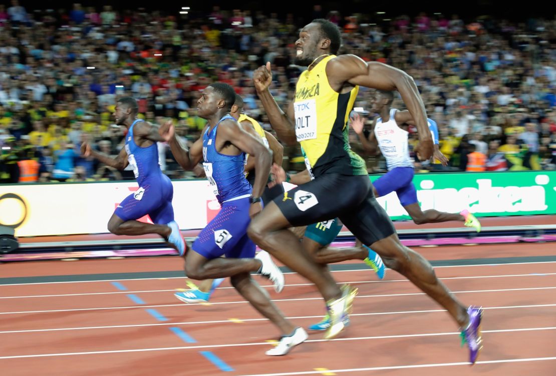 Usain Bolt, Justin Gatlin dip for the line