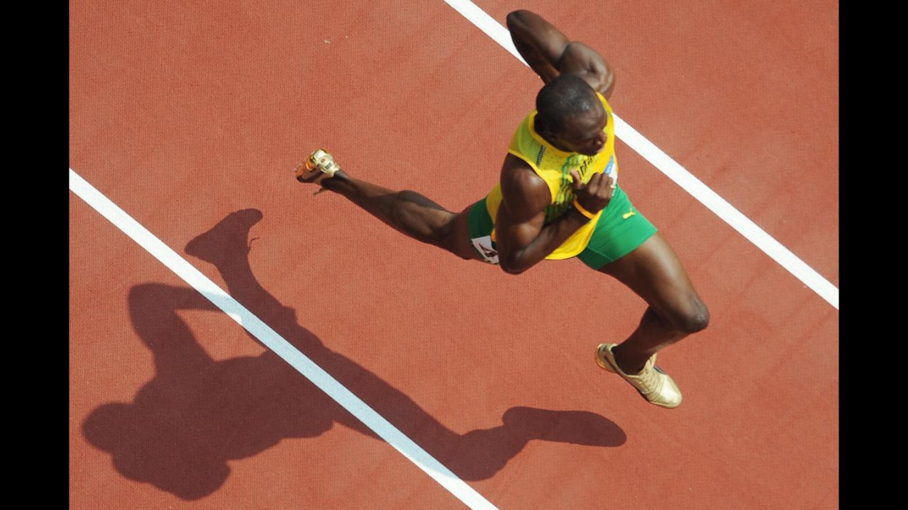 Bolt competes in a 200-meter heat at the Beijing Olympics. A few days after winning the 100, Bolt completed the double by setting a new world record in the 200 final. He finished in 19.30 seconds, breaking the record that American Michael Johnson had held since 1996.