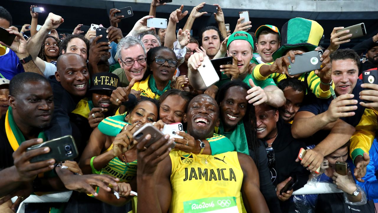Bolt celebrates with fans after winning the 200-meter at the 2016 Olympics. In Rio, Bolt completed an unprecedented "triple-triple": three straight Olympic golds in the 100-meter, the 200-meter and the 4x100 relay. In 2017, Bolt was stripped of his 2008 relay medal after it was confirmed that teammate Nesta Carter tested positive for a banned substance.