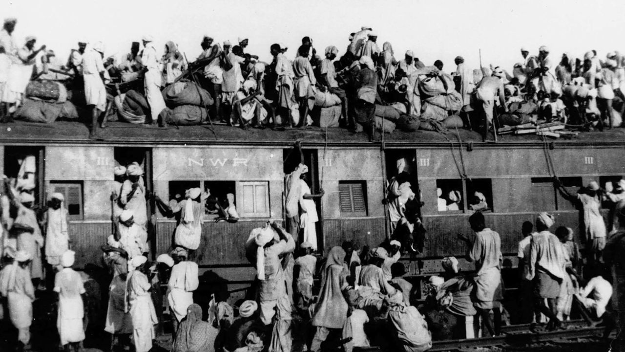 Hundreds of Muslim refugees crowd atop a train leaving New Delhi for Pakistan in this September 1947 file photo. India will celebrate its 50th anniversary of Independence from Britian on Friday Aug. 15, 1997. The day also marks the division of the British empire into officially Muslim Pakistan and largely Hindu India. That division was accompanied by bloody religious riots in 1947, the memories of which haunt freedom celebrations. (AP Photo)