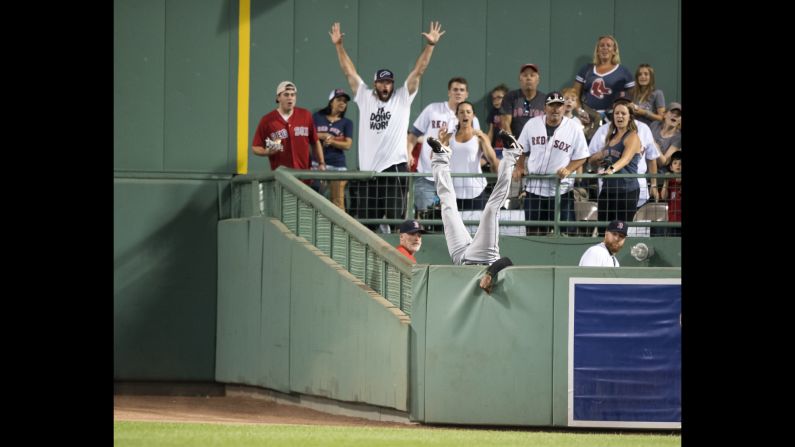 Cleveland's Austin Jackson leaps over the bullpen wall in Boston to rob Hanley Ramirez of a home run on Tuesday, August 1. <a href="index.php?page=&url=http%3A%2F%2Fbleacherreport.com%2Farticles%2F2725176-austin-jackson-flips-over-wall-while-robbing-home-run-at-fenway" target="_blank" target="_blank">See the spectacular catch</a>