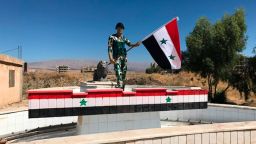 Syrian Army troops decorated this monument to their soldiers. The Golan Heights are in the background. 